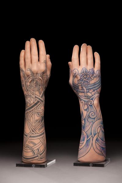 tattooed arms