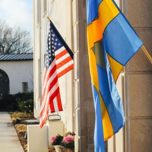 Swedish and American Flags on building