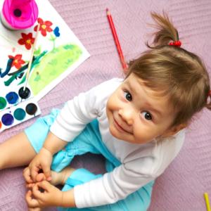 toddler with paint