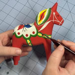 Painting a Dala Horse